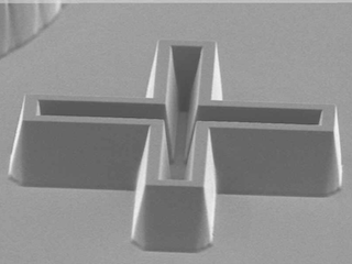SEM-image of alignment feature (photoresist) with drafted sidewalls
